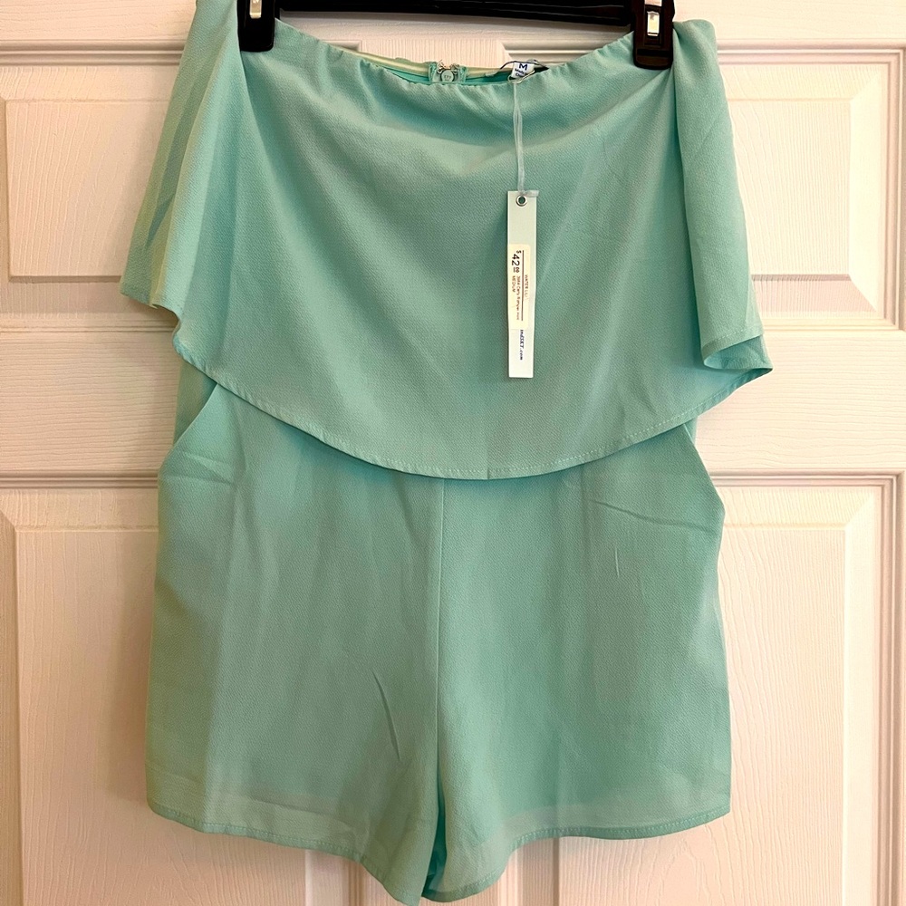 Francesca’s sea foam green romper